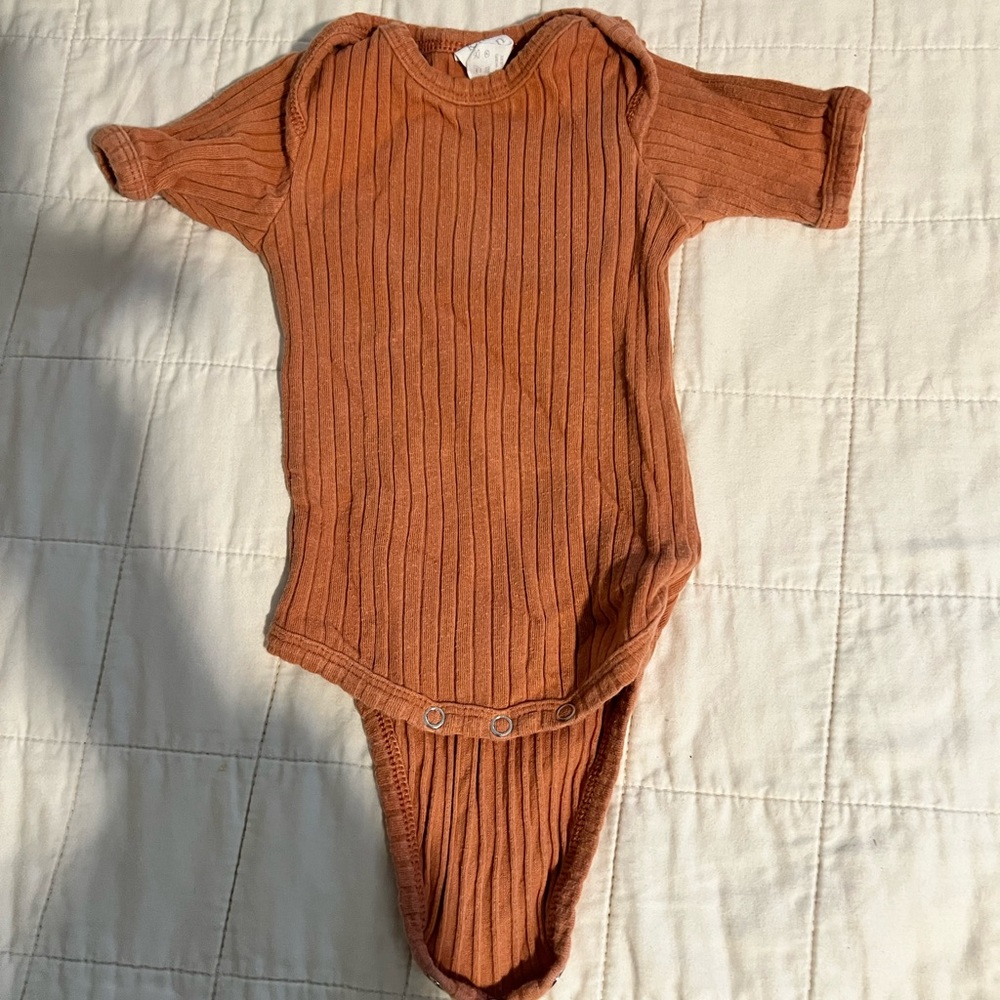 Kate Quinn ribbed onesie